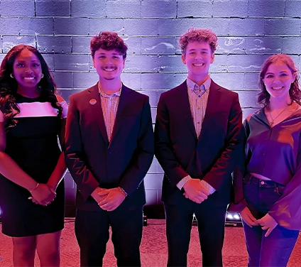 students standing in row