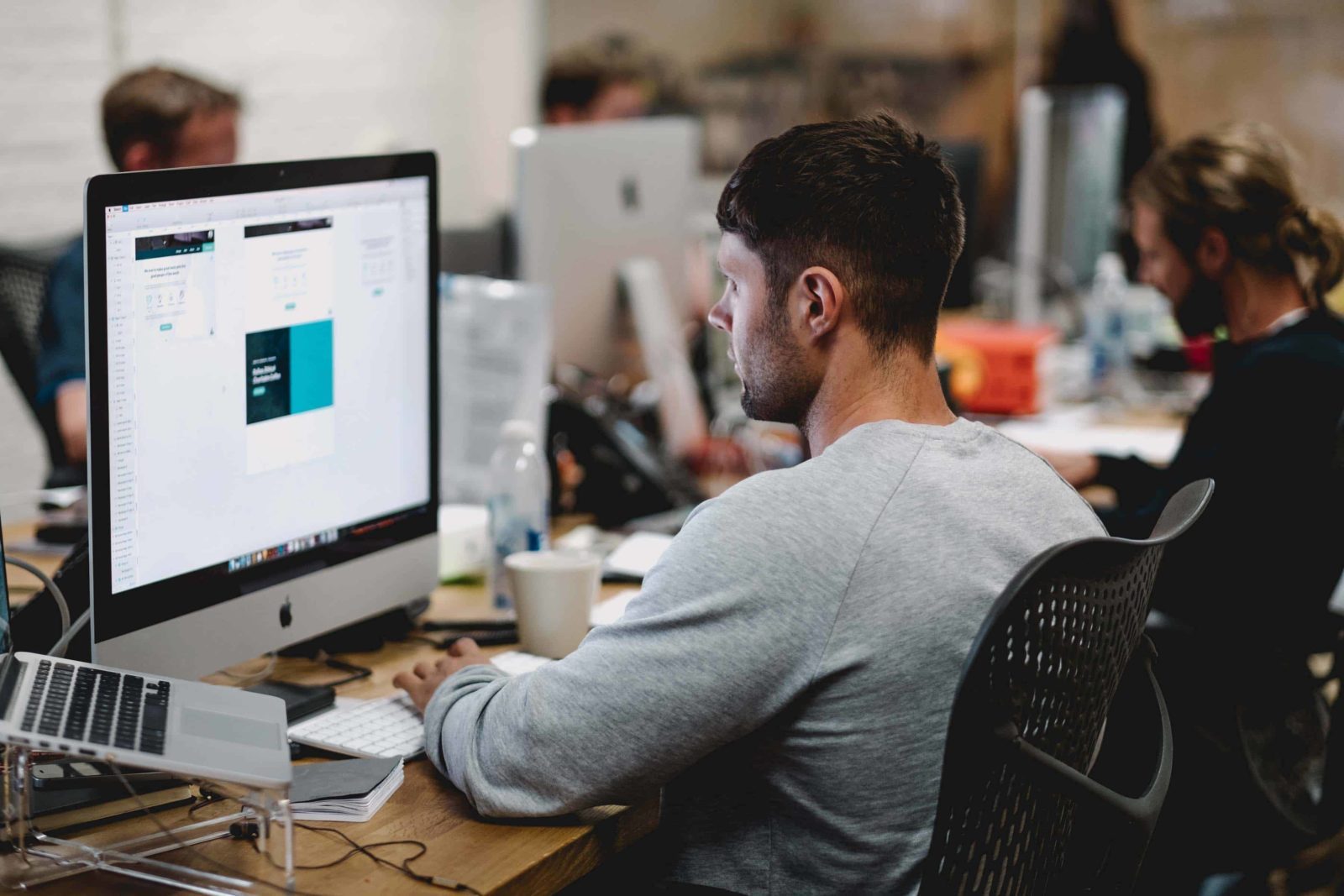 man sitting on computer